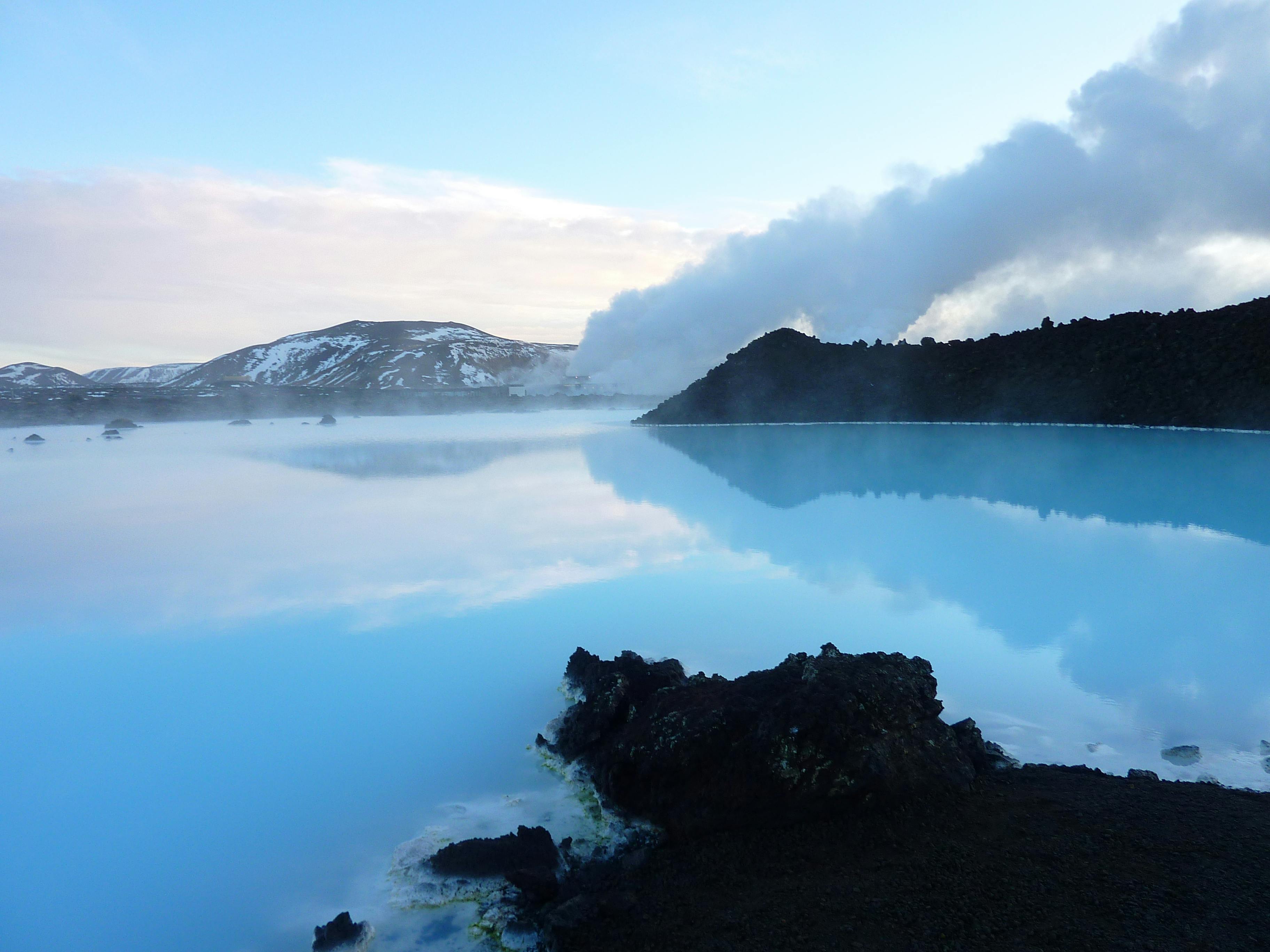 People relaxing in the milky blue geothermal waters of Blue Lagoon